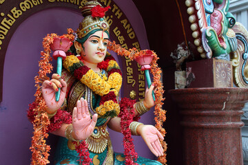 statue of a divinity in an hindu temple (sri senpaga vinayagar)  in singapore 