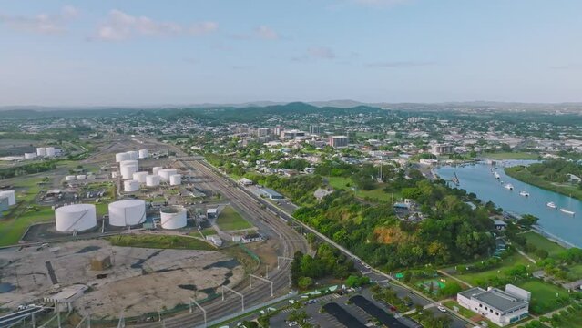 High angle aerial drone view of Gladstone, a coastal city in Central Queensland, Australia, and home to Queensland's largest multi-commodity shipping port, the Port of Gladstone.