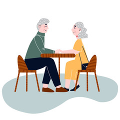 Happy elderly couple sitting in a cafe. Old couple on date.