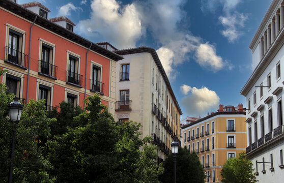 Fototapeta Exterior view of colorful historical buildings in Central Madrid, Spain, Europe. Traditional European street scene in the Austrias neighborhood of the Spanish capital.