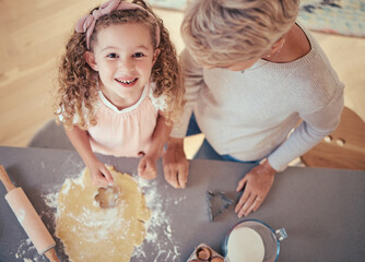 Food, family and portrait of girl baking with grandmother in kitchen, happy, relax and prepare...