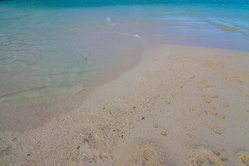 White sand beach sea wave sky with cloud