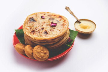 Sweet Khoya roti or Peda chapati paratha made using thickened cream milk or Khoa, khowa, mawa