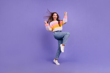 Full length photo of overjoyed delighted lady raise fists shout yes hooray luck isolated on violet color background