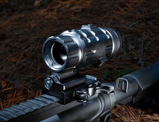 Magnifying sight on an assault rifle