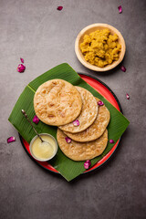 Puran poli, Puran roti, Holige, Obbattu, or Bobbattlu, is Indian sweet flatbread from Maharashtra