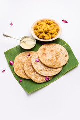 Puran poli, Puran roti, Holige, Obbattu, or Bobbattlu, is Indian sweet flatbread from Maharashtra