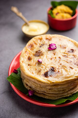 Puran poli, Puran roti, Holige, Obbattu, or Bobbattlu, is Indian sweet flatbread from Maharashtra