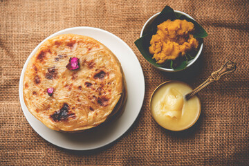 Puran poli, Puran roti, Holige, Obbattu, or Bobbattlu, is Indian sweet flatbread from Maharashtra