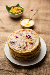 Puran poli, Puran roti, Holige, Obbattu, or Bobbattlu, is Indian sweet flatbread from Maharashtra
