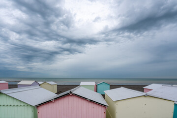 Pastel tinted, colored beach cabins - 536070451