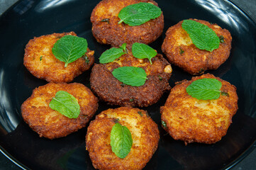 Indian potato dumpling on table