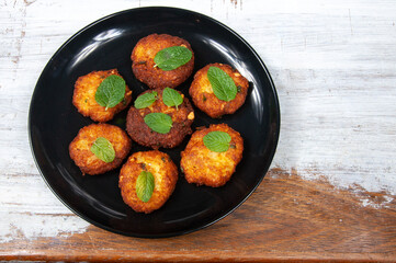 Indian potato dumpling on table