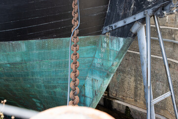 Anchor chain of historical battleship in dry dock