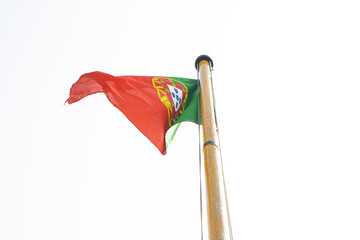 Waving National flag of Portugal in the wind on ship's mast