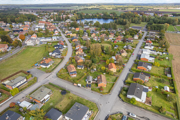 Aerial view on a little village in Sweden, Europe. Many private and residential houses and beautiful nature.  - obrazy, fototapety, plakaty