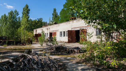 Destroyed abandoned police garage in ghost city Pripyat after explosion fourth reactor Chernobyl...