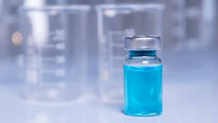 Close-up of vaccine bottles and syringes for medical use, medicines for human therapeutic use, vaccines for virus protection.