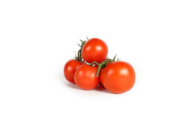tomato with leaves isolated in studio on white background 