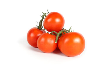 tomato with leaves isolated in studio on white background 