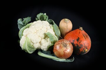 vegetables on a black background