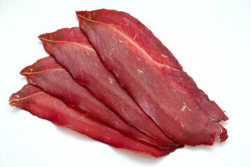 Sliced Pastrami meat isolated on white background