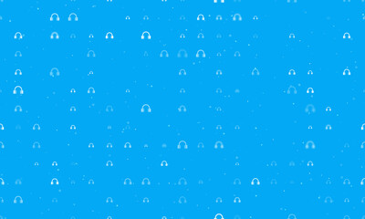 Seamless background pattern of evenly spaced white headphones symbols of different sizes and opacity. Vector illustration on light blue background with stars