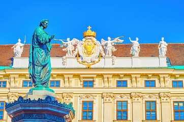 The monument to Kaiser Franz I with facade of Reich Chancellery Wing of Hofburg, Vienna, Austria