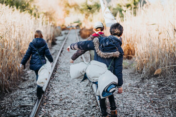 Anonymous of children hiking in the woods