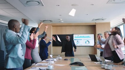 Business team success, meeting goal and happy staff celebrate financial deal target in office. Strategy collaboration in corporate, company analytics victory and happiness at boardroom table together