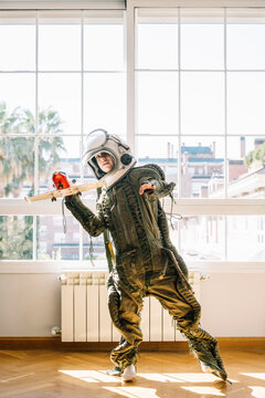 Adorable kid with a real astronaut uniform