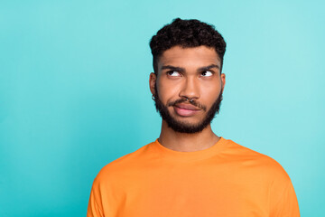 Close up photo of minded man wear trendy orange clothes look empty space idea plan hmm hard...