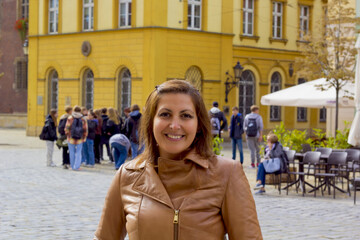 portrait of a happy woman  in wroclaw city, poland
