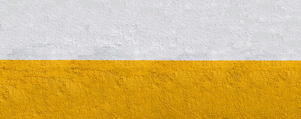 white and yellow painted exterior wall texture. 
wide and colorful background of empty wall