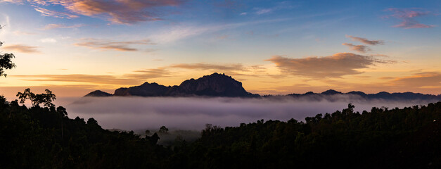 Obraz na płótnie Canvas Sunrise sea of fog above Khao Sok national park, Surat Thani, Thailand
