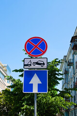 Group of traffic signs on the pole. 