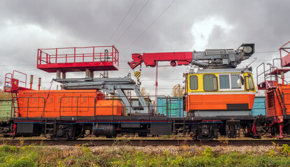 Obraz premium Petrol railcar for installation, repair, emergency and restoration work of the contact network on electrified railways. Side view 