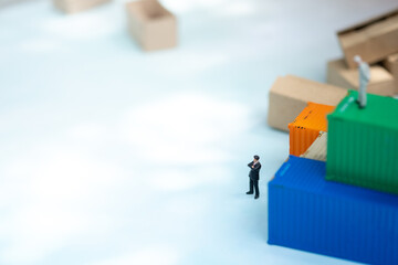 Miniature people: Businessman with copy space for text using as background transportation logistic business concept.