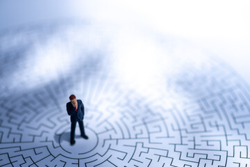 Miniature people: Business maze with copy space for text using as background saving, investment, money, financial, business analytics concept.