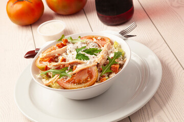 Tomato salad, chicken and Greek yogurt sauce