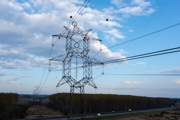 clown shape high voltage power lines high voltage electrical transmission tower next to M5 highway in Pusztavacs town hungary