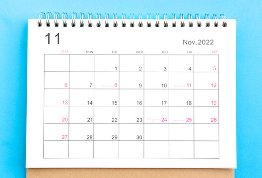 calendar november 2022 top view on a blue background