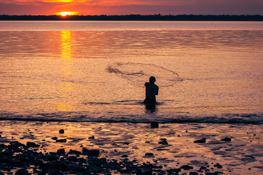 fishing at sunset