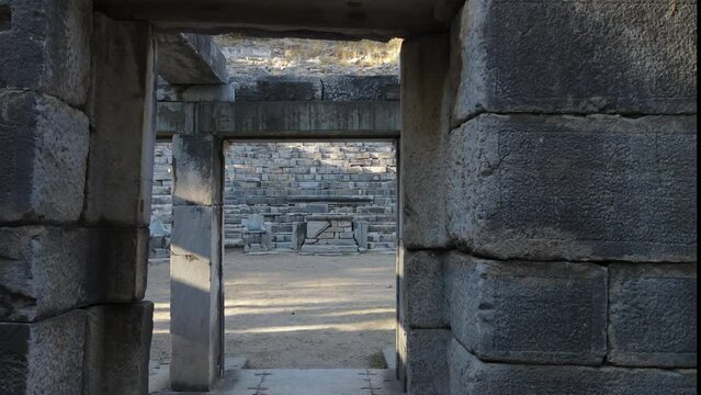 View of historical ruins, columns, ancient theater and temples in the ancient city of Priene.
