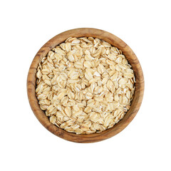 Oat flakes uncooked in wooden bowl