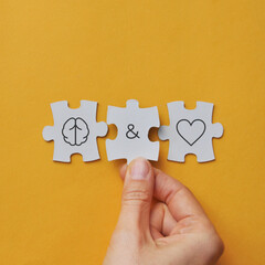 Puzzles with images of the brain and heart. Harmony between the senses and the mind