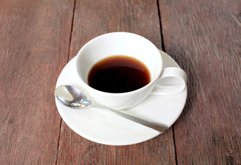 cup of coffee on wooden table