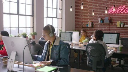 Graphic designer people, computer studio and creative startup business workspace with gen z office, online productivity. Information technology, website design or digital marketing company staff - Powered by Adobe