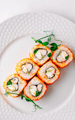 fish sushi roll in white plate