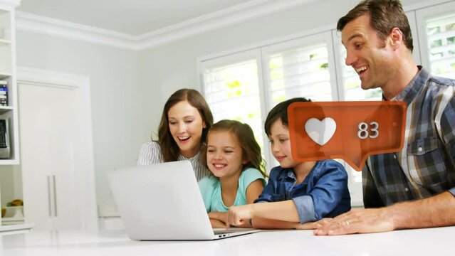 Animation of social media icon with growing number over caucasian family using laptop